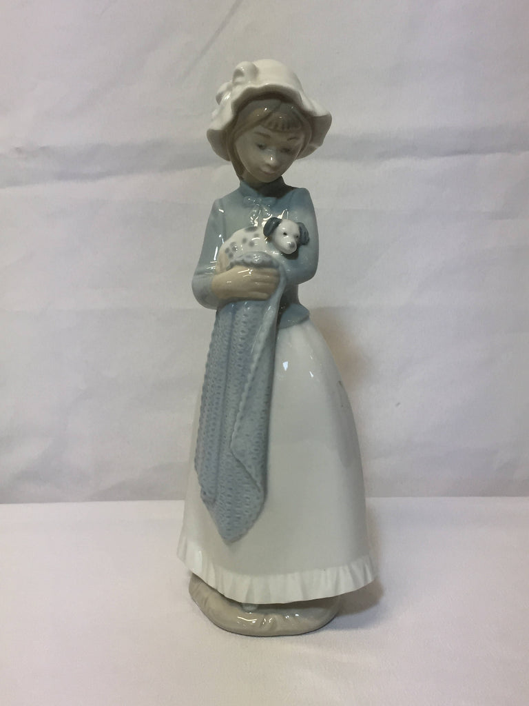 NAO/ LLADRO, porcelain figurine "Girl with a puppy dog." SOLD- SOLD - SOLD