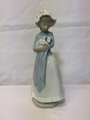 NAO/ LLADRO, porcelain figurine "Girl with a puppy dog." SOLD- SOLD - SOLD