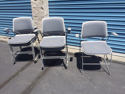 Vintage Stacking Arm Chairs , metal with upholstered seats and backs ( 13 available)