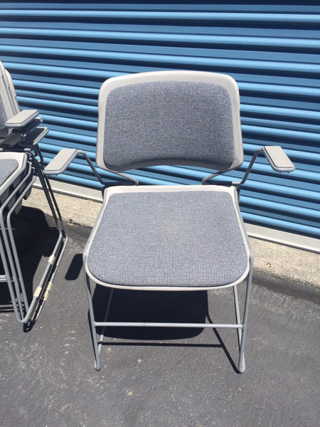 Vintage Stacking Arm Chairs , metal with upholstered seats and backs ( 13 available)