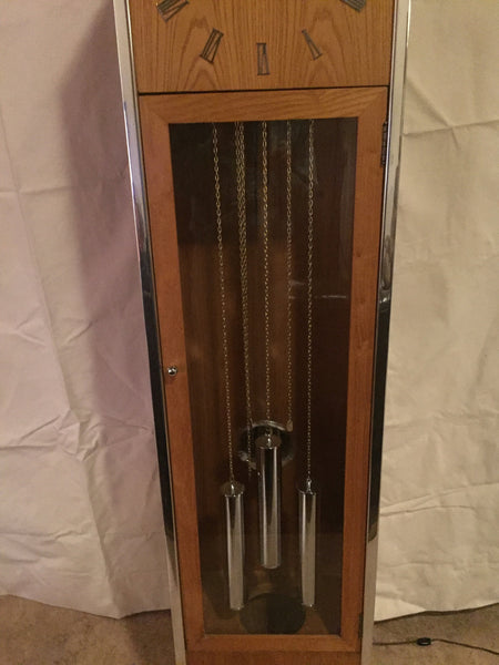 Vintage Mid Century Modern Oak and Chrome Pendulum Grandfather Clock in the style of George Nelson for Howard Miller