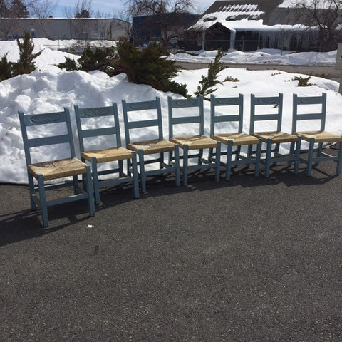 Set of 7 Vintage Folk Art Primitive Mexican Painted Carved Ladder Back Chairs rush seats. Original light blue distressed painted finish.