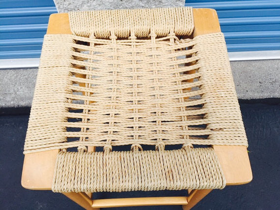 Vintage Danish Modern stool with woven rope seat  Mid Century Wegner Eames