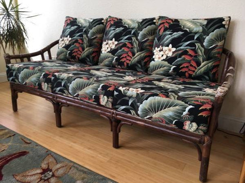 Vintage Mcguire Rattan Sofa with hawaiian style floral cushions