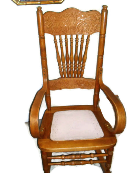 Early twentieth century press back oak wood rocking chair